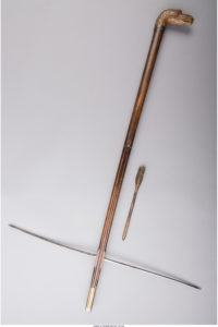A Carved Wood Crossbow Walking Stick, late 19th century
